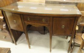 A mahogany and satinwood cross banded sideboard with two cupboard doors and single central drawer