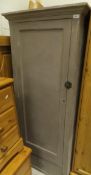 A mushroom painted single door cupboard CONDITION REPORTS Cupboard has been cut at
