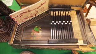 A boxed auto-harp together with instruction book and one volume of Beatrice Perham Krone "Harmony