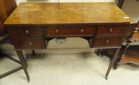 A 19th Century mahogany side table, the plain top above two banks of two drawers,
