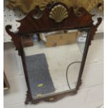 A mahogany fretwork wall mirror