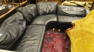 A black leather corner sofa suite