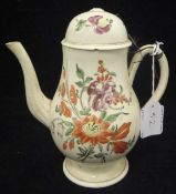An 18th Century Leeds cream ware baluster shaped chocolate pot and lid with floral spray painted