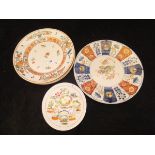 Four Chinese polychrome decorated plates with all-over floral and foliate decoration,