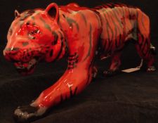 A Royal Doulton Flambé figure of a stalking tiger, 34.