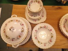 A Royal Doulton "Rosell" (H4976) part dinner service, comprising ten dinner plates, ten side plates,