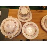 A Royal Doulton "Rosell" (H4976) part dinner service, comprising ten dinner plates, ten side plates,