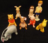 A Beswick Walt Disney Products "Christopher Robbin / Winnie the Pooh" set comprising Christopher