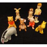 A Beswick Walt Disney Products "Christopher Robbin / Winnie the Pooh" set comprising Christopher