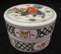 A Chinese Kangxi porcelain bowl and cover, the top decorated with figure riding a kylin,