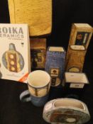 A collection of Troika Pottery to include a rectangular vase with disc decoration by Linda Thomas