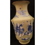 A Chinese celadon glazed vase decorated in blue and white with figures and bird amongst clouds,
