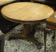 A Victorian mahogany breakfast table with faceted column to tripod base,