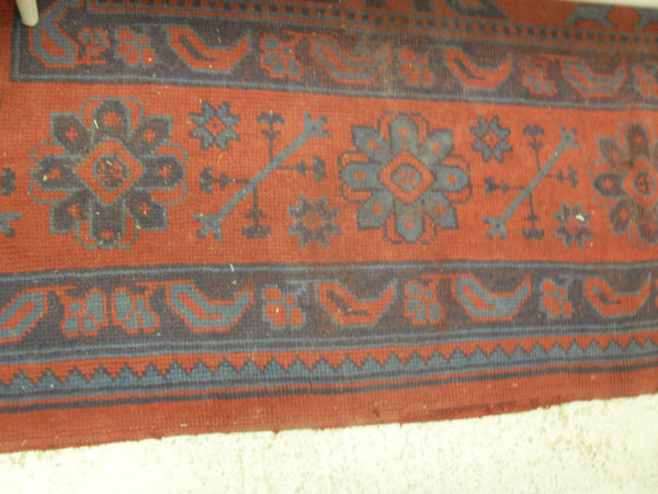 A Donegal carpet, the central panel set with scrolling decoration on a red ground, - Image 5 of 10