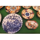 A collection of Japanese Imari wares including three vases, one with lid, three various plates,