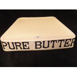 An early 20th Century Parnell & Sons Ltd "Pure Butter", shop display dish in cream glazed pottery,