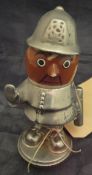 An early 20th Century chrome plated "Bobby" car mascot as a policeman with pottery head,