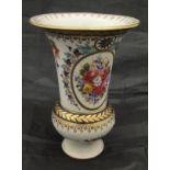 A Sèvres style vase with floral spray decoration within panels of bleu royale, gilt highlighted,
