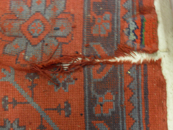 A Donegal carpet, the central panel set with scrolling decoration on a red ground, - Image 3 of 10