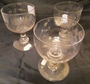 A pair of late 18th Century cut glass goblets and another similar,