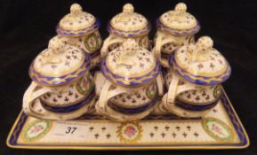 An early 20th Century Dresden six place lidded cup set of baluster form with all-over floral