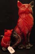A Royal Doulton Flambé veined figure of a seated cat together with a Royal Doulton Flambe figure of