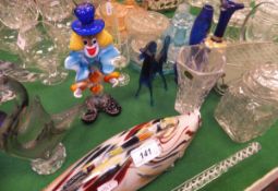 A Murano glass clown, similar fish ornament, various other animal ornaments, dressing table sets,
