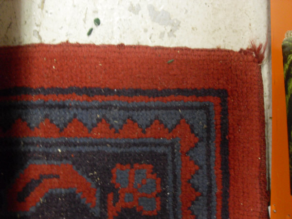 A Donegal carpet, the central panel set with scrolling decoration on a red ground, - Image 4 of 10