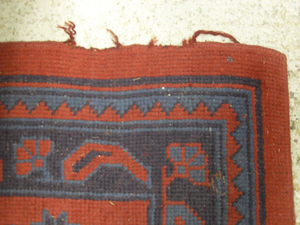 A Donegal carpet, the central panel set with scrolling decoration on a red ground, - Image 6 of 10