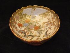 A Japanese Meiji Period Satsuma bowl with shaped rim,