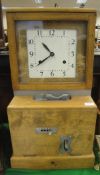 An early to mid 20th Century stained beech cased clocking in / clocking out clock,