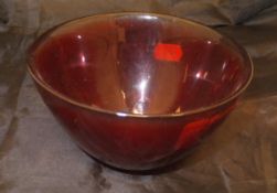 An Orrefors ruby glass bowl with clear rim