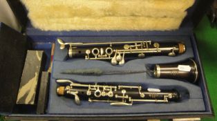 A Cabart Junior oboe, three section, stamped "Cabart à Paris", in hard case,