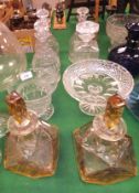 A pair of early 20th Century Art Deco style decanters with cut and amber flash decoration,