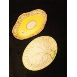 A 19th Century Wedgwood cream ware leaf design oval dish and an early 19th Century Derby yellow