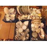 A box containing assorted collector's plates,