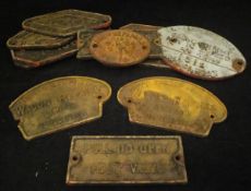 A collection of cast iron wagon plates, various, including "For repairs,