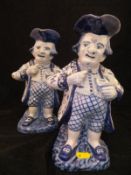 A pair of Continental tin-glazed pottery character jugs as a snuff taker in tricorn hat