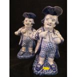 A pair of Continental tin-glazed pottery character jugs as a snuff taker in tricorn hat