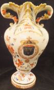 A late 19th Century Continental armorial vase in the "Japan" pattern palette,