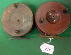 Two 4" diameter wooden Nottingham style reels with star backs,