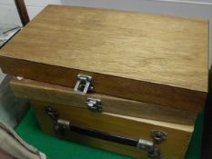 A collection of four wooden fly cases, two of which contain a good selection of lures and may flies,