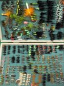 A Bob Church double tiered fly case containing a collection of lures,