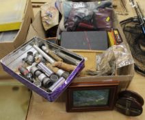 A collection of assorted fishing tackle to include reels, tackle boxes, fly tying equipment,