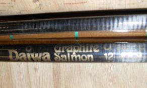 A Daiwa graphite salmon fly rod and a further fibreglass example