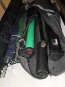 A collection of miscellaneous fishing tackle and luggage to include two rod holdalls containing