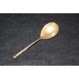 A Russian silver spoon with engraved Nelio floral design decoration to back