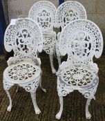 Four white painted iron garden chairs