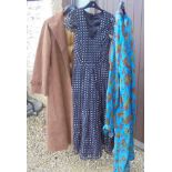 A vintage Monsoon blue dress, together with a further vintage black dress,