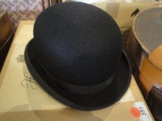 A ladies Herbert Johnson black hard top bowler hat in cardboard Herbert Johnson box